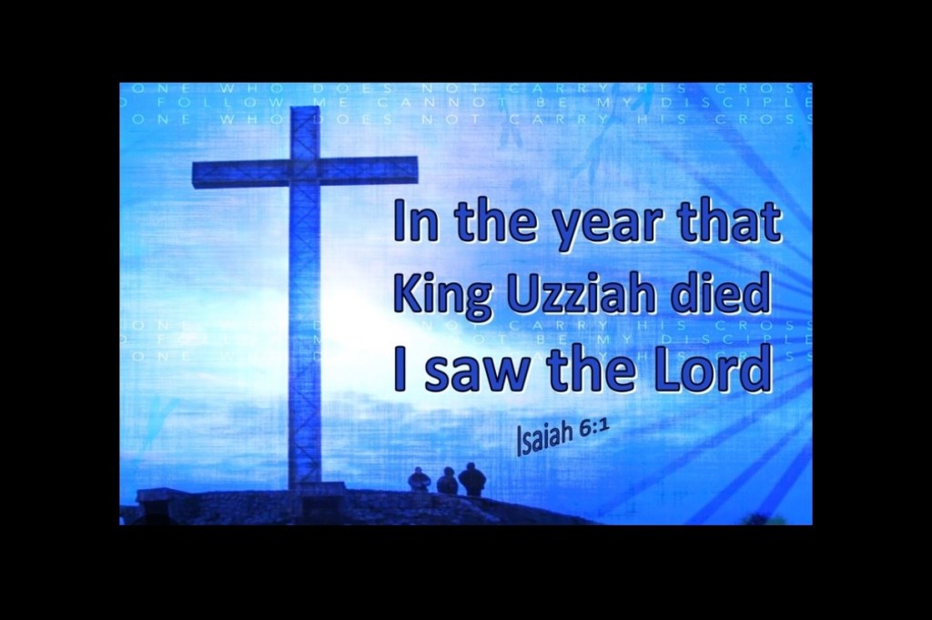Image featuring a silhouette of a cross with text overlay that reads 'In the year that King Uzziah died I saw the Lord' and references Isaiah 6:1. The background has a blue gradient with abstract patterns.